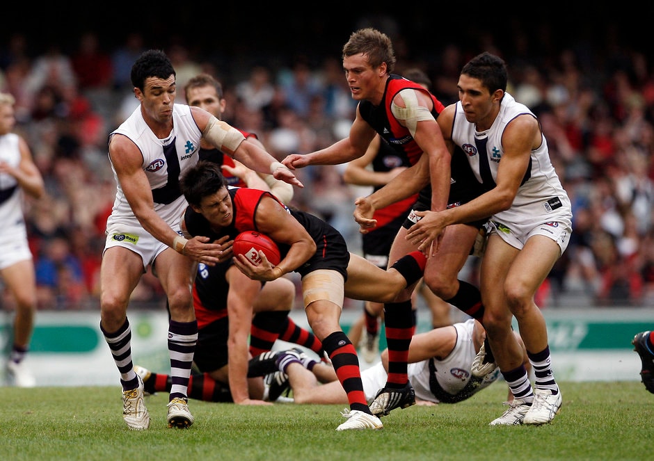 AFL 2010 Rd 02 - Essendon v Fremantle Fremantle's Ryan Crowley tackles Essendon's Angus Monfries during the AFL Round 02 match between Essendon Bombers and the Fremantle Dockers at Etihad Stadium, Melbourne.